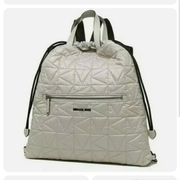 MICHAEL Kors Winnie Lg Quilted Canvas Drawstring Backpack Aluminum - Picture 1 of 4